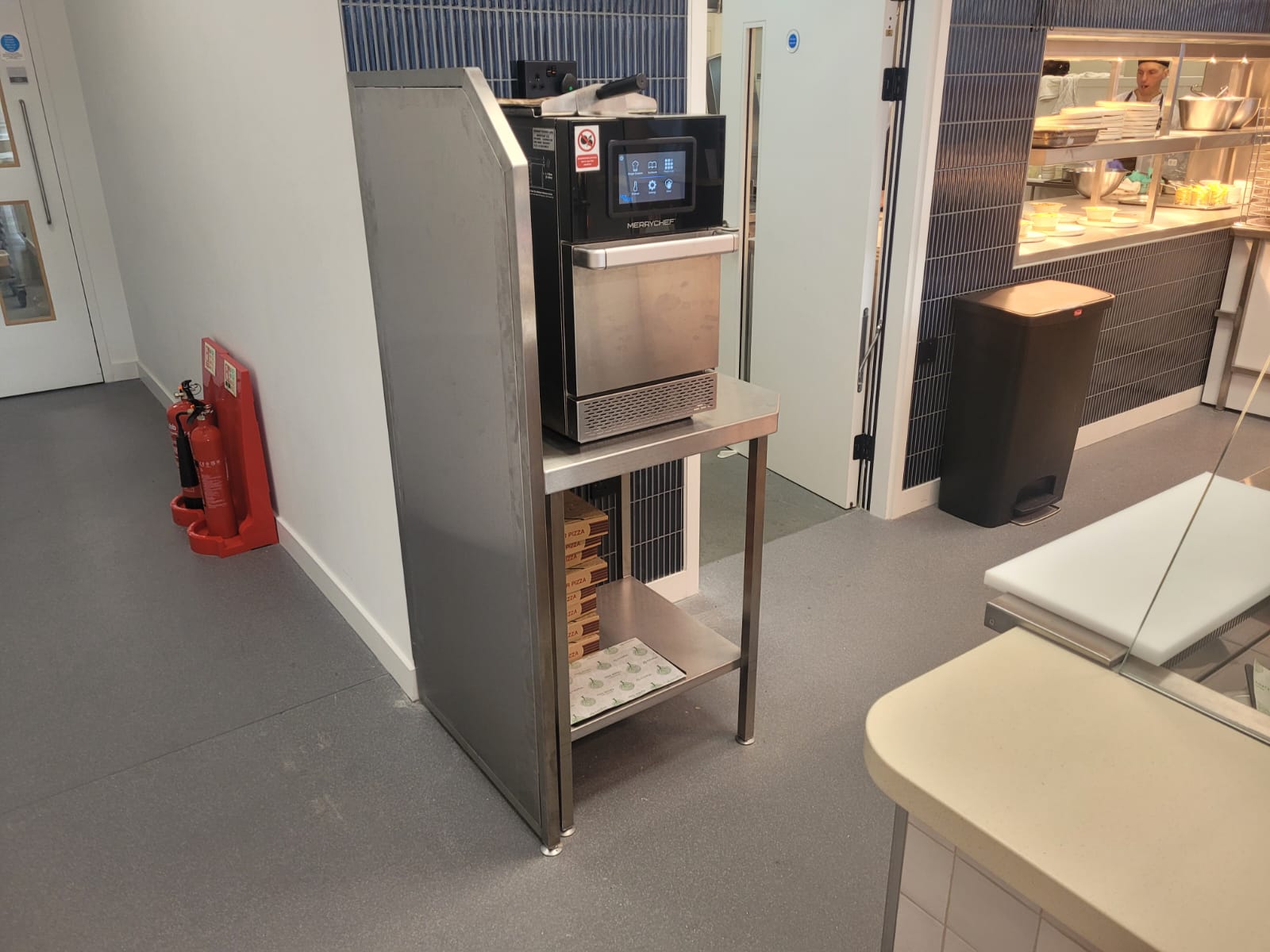 Dual Rational iCombi Pro 10-grid combi ovens installed side-by-side in Equinor's commercial kitchen, providing versatile cooking capabilities for the corporate dining facility.