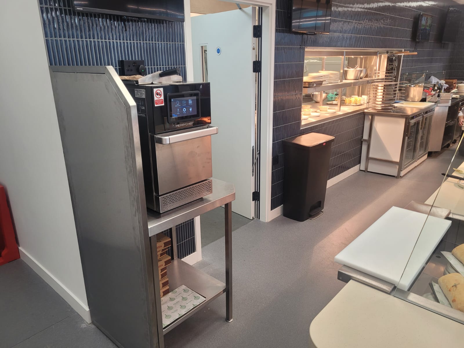 Dual Rational iCombi Pro 10-grid combi ovens installed side-by-side in Equinor's commercial kitchen, providing versatile cooking capabilities for the corporate dining facility.